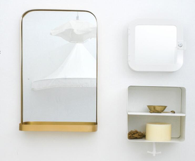 Gold wall mirror with shelf